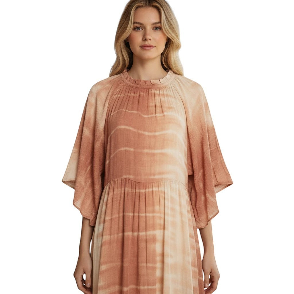 Flowing boho maxi dress in a tie-dye pattern of earthy tones, featuring a ruffled neckline, tiered layers, and wide flutter sleeves.
