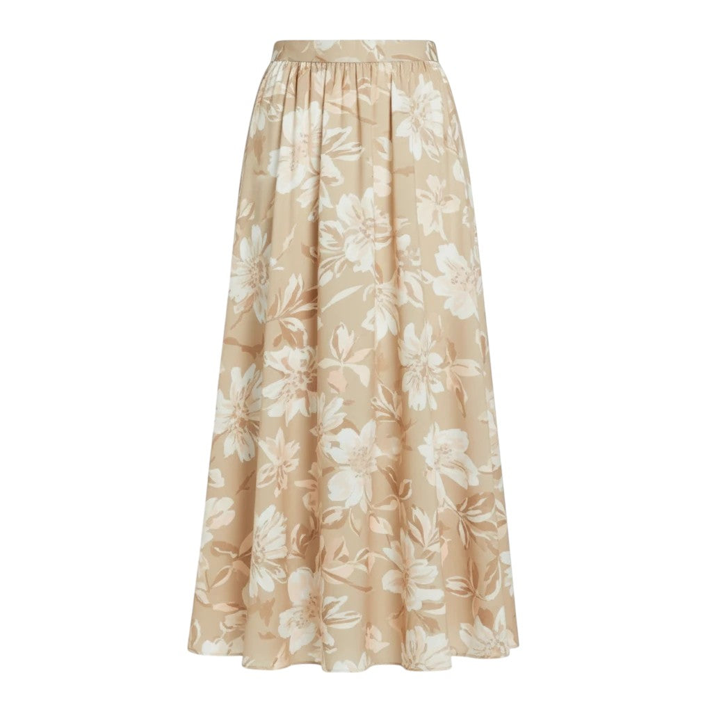 Flowing beige maxi skirt with an all-over white and tan floral print and an elastic waistband.