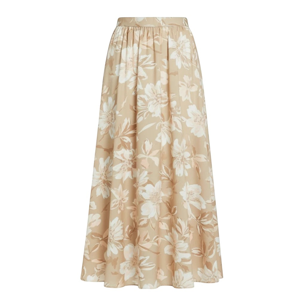 Flowing beige maxi skirt with an all-over white and tan floral print and an elastic waistband.