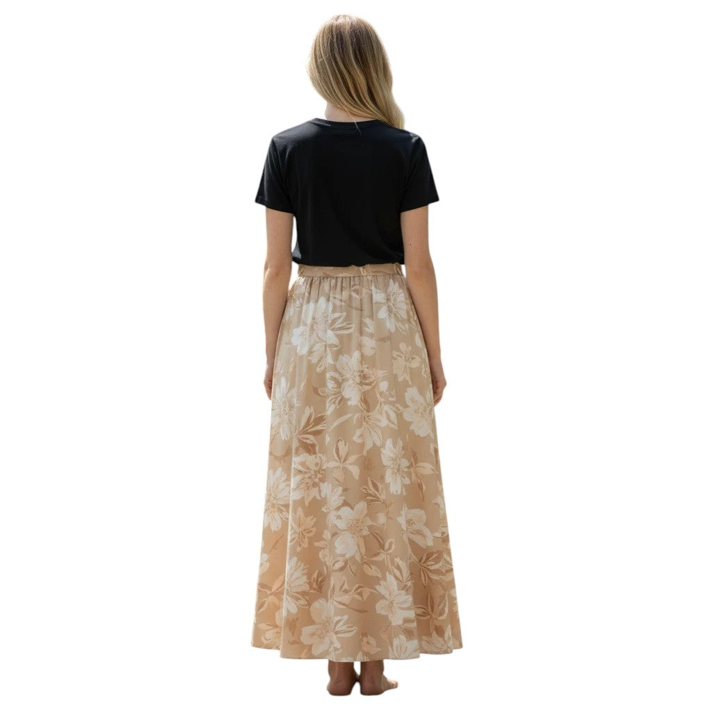 Beige floral print maxi skirt with elastic waistband, flowing fabric, and a graceful silhouette.