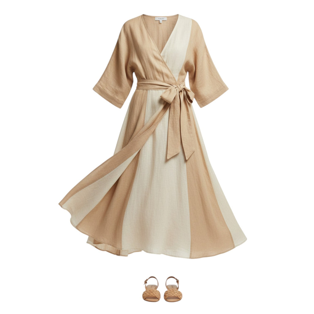 Beige and cream striped linen wrap midi dress with a V-neckline and self-tie belt, paired with woven sandals.