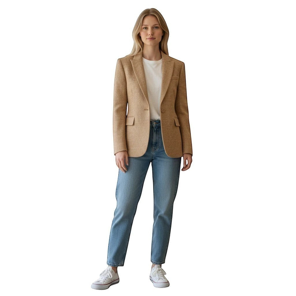 White & Rustic Boutique camel textured single button blazer with lapel, flap pockets, and cuff buttons. Worn by a woman with jeans.